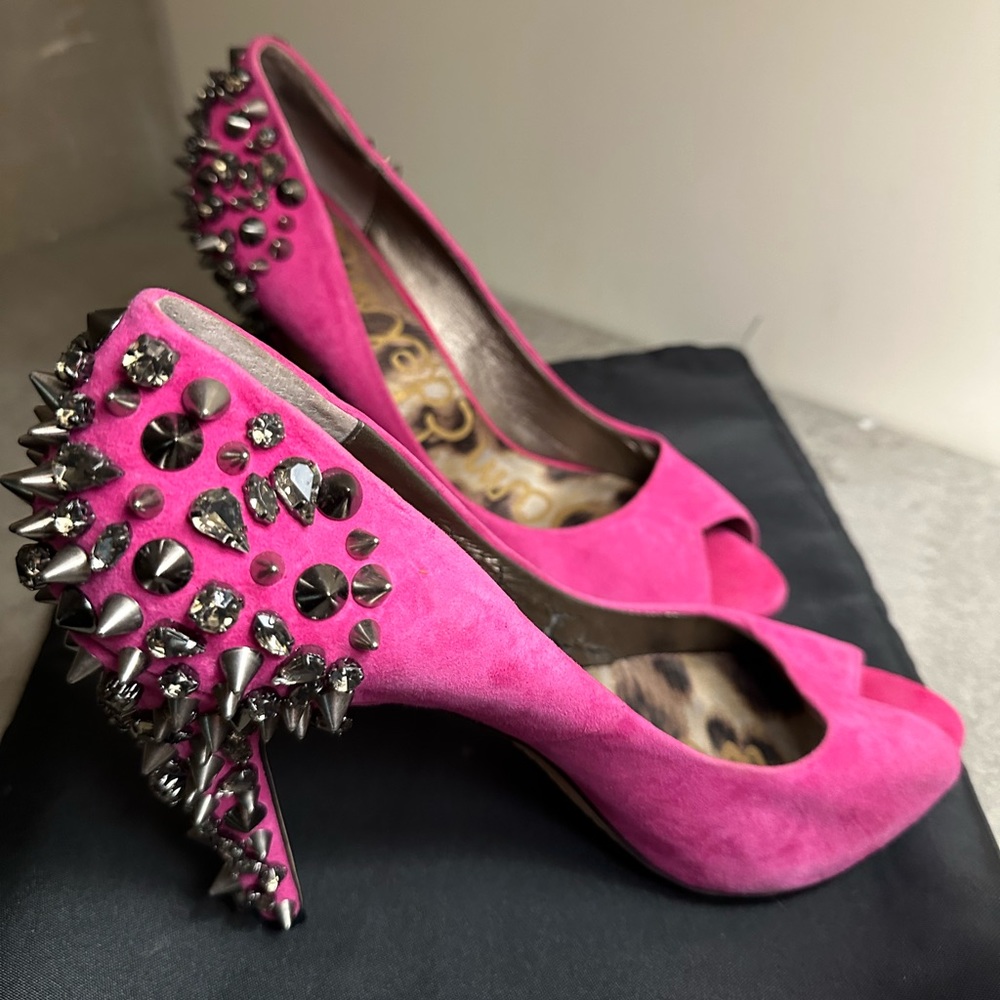 Pink spike Sam Edelman peep toe heals.